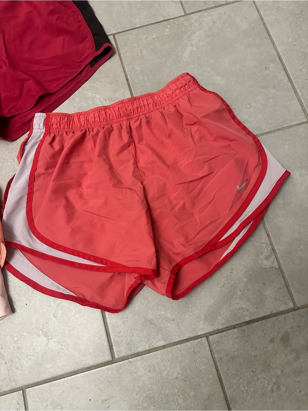 Nike Women’s medium Dri-FIT Running Shorts - Coral / Peach / pink - Picture 2 of 6